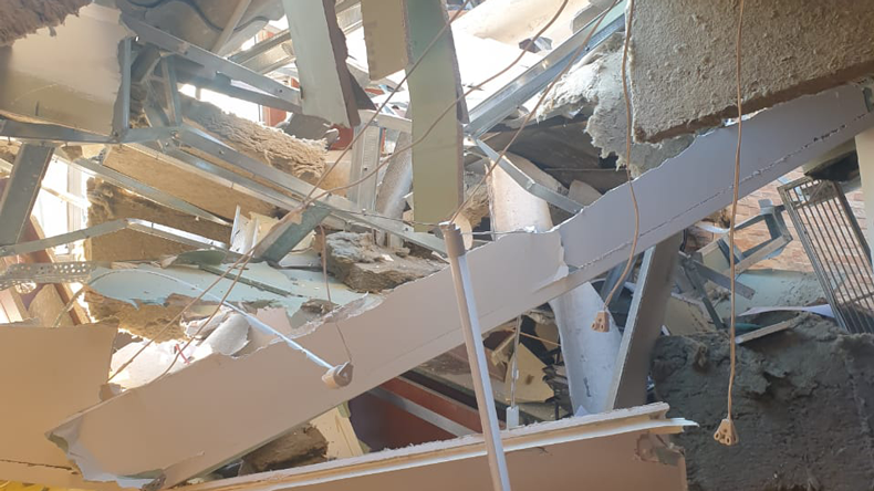 The blast-damaged offices of Grimaldi's agent in Beirut