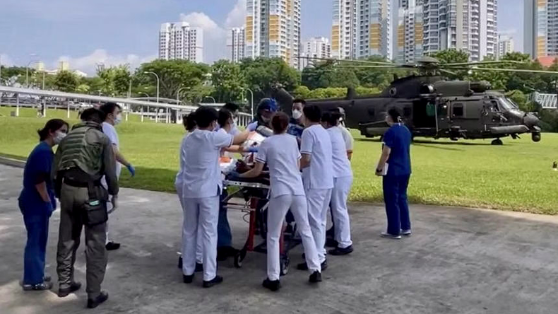 An injured crewman being attended to at Singapore General Hospital after being airlifted there on the Republic of Singapore Air Force’s Rescue 10 H225M medium-lift helicopter