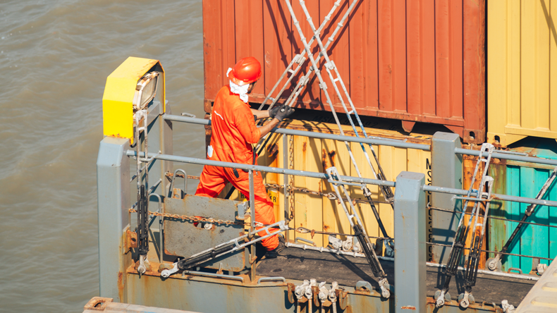 Seafarer on containership. Credit: Evgeny Shulin/Shutterstock.com