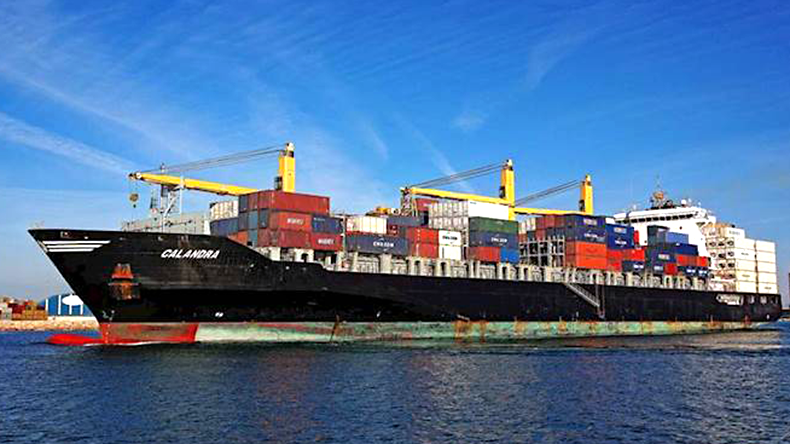 Calandra containership arriving at port on a sunny day with blue sky