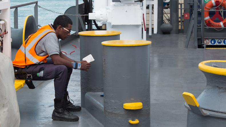 Seafarer reading. Credit Alexander Schedrov/Shutterstock.com