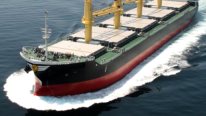 Jinhui bulk ship close up of bow with white waves at sea