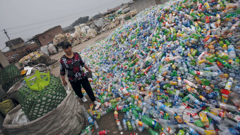 Plastic bottles at China recycling dump