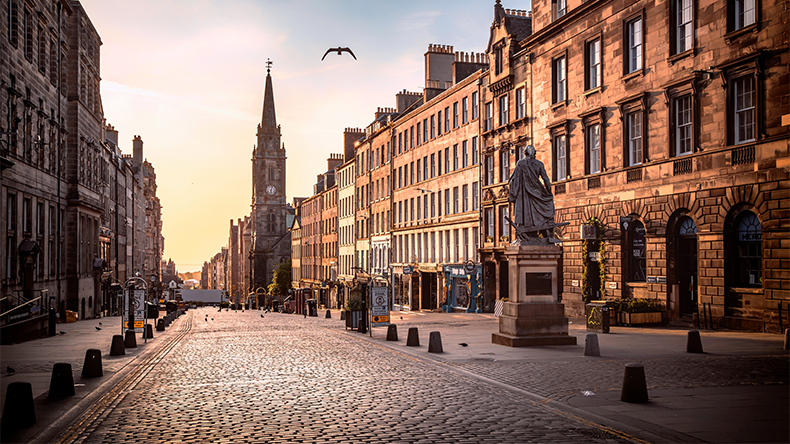 Edinburgh Royal Mile and the Adam Smith Statue at sunrise