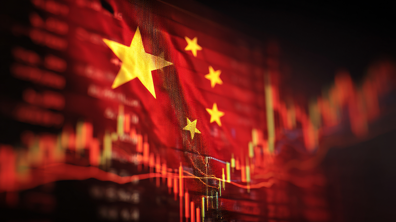 Chinese flag overlaid with financial stock market graphs and data in red tones