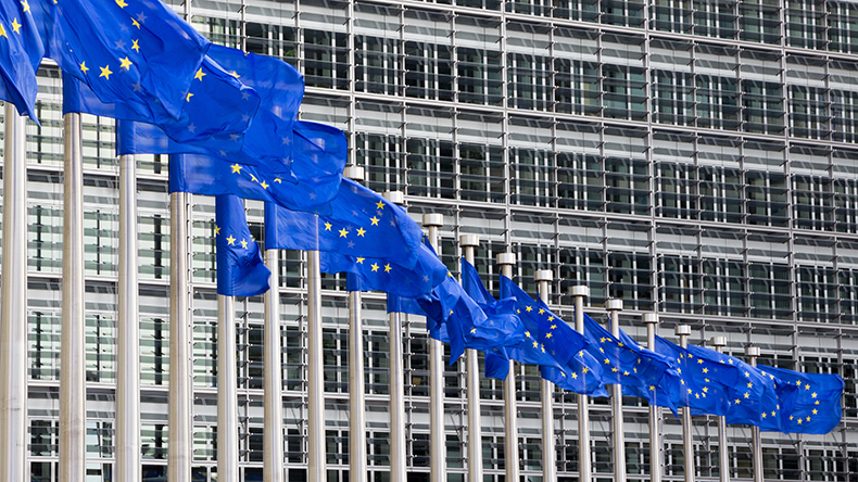 Flags in front of the EU Commission building in Brussels