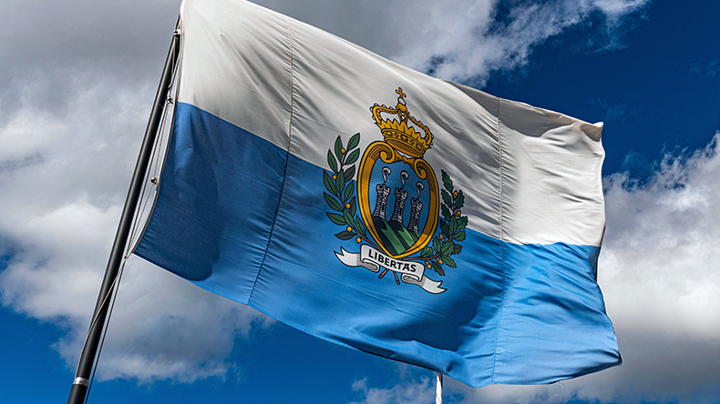 Flag in the historic center, Unesco world heritage site San Marino, Italy