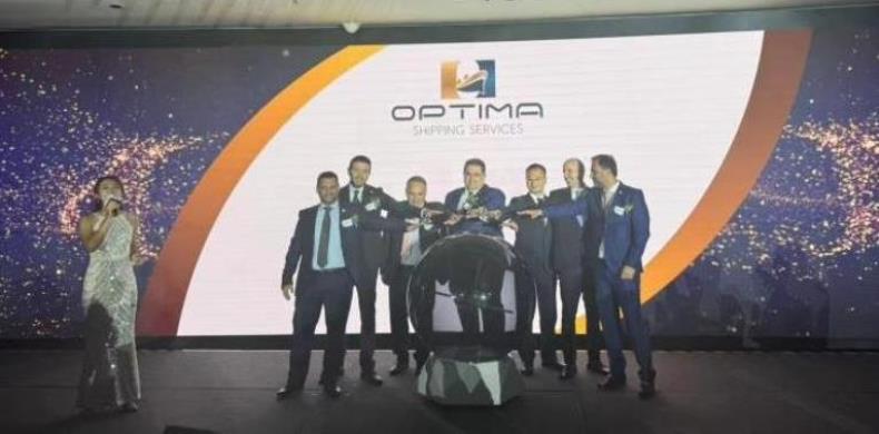 A ribbon-cutting ceremony for a new Optima office in Singapore