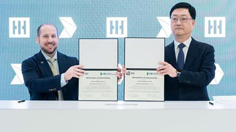 Brian Blanchette President of Ingalls Shipbuilding and Joo Wonho CEO of the Naval and Special Ship at HD Hyundai Heavy Industries signing of a memo