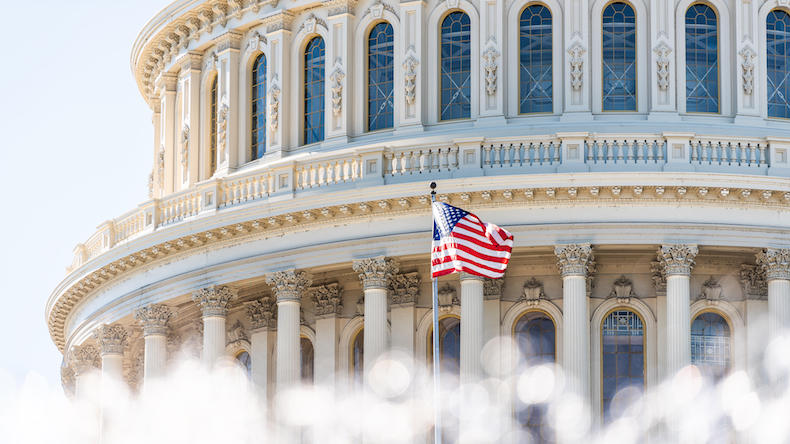 US Congress dome closeup with background of water fountain splashing