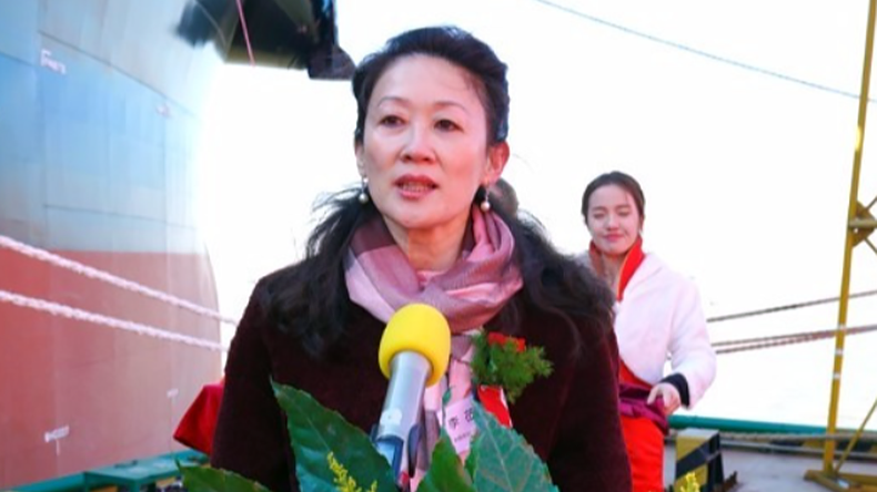 Export-Import Bank of China shipping banker Li speaking at a vessel naming ceremony in 2018.