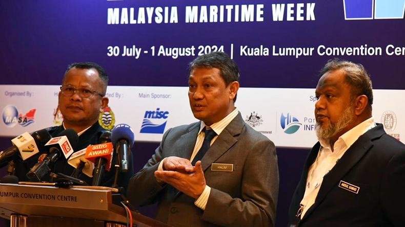 Director General of Malaysia Marine Department, Captain Mohamad Halim Ahmed speaks (in the middle) at the press conference on July 30, 2024