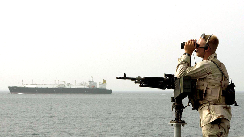 US Navy master-at-arms seaman stands watch