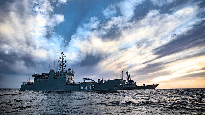 Estonian Navy Lindormen-class minelayer EML Wambola (A433), left, and the Arleigh Burke-class guided-missile destroyer USS Porter