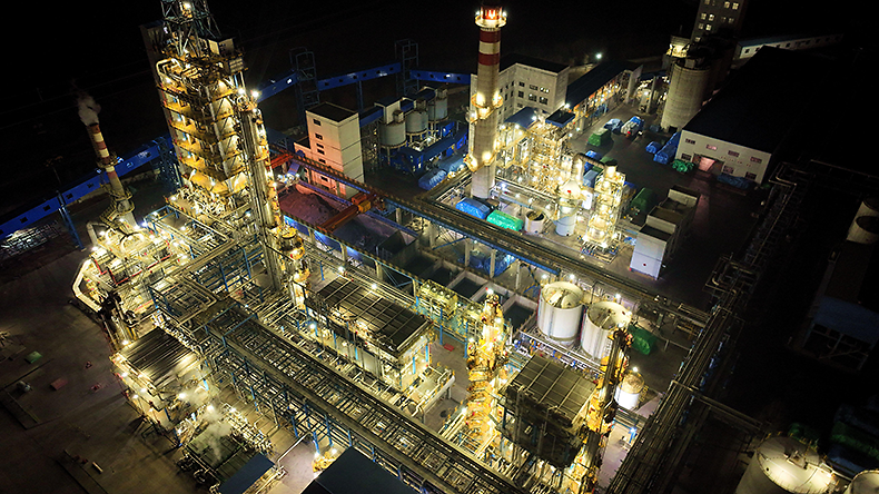 Aerial photo shows a brightly lit oil refinery at night in Binzhou, East China’s Shandong Province