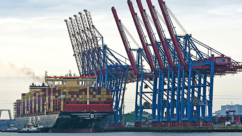 Containership loading boxes with cranes at Container Terminal Tollerort (CTT) in Hamburg