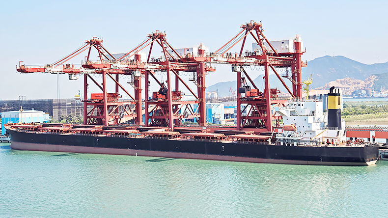Type of cargo terminal and cranes, berths for transshipment of bulk cargo, iron ore and coal. Port Zhuhai, China