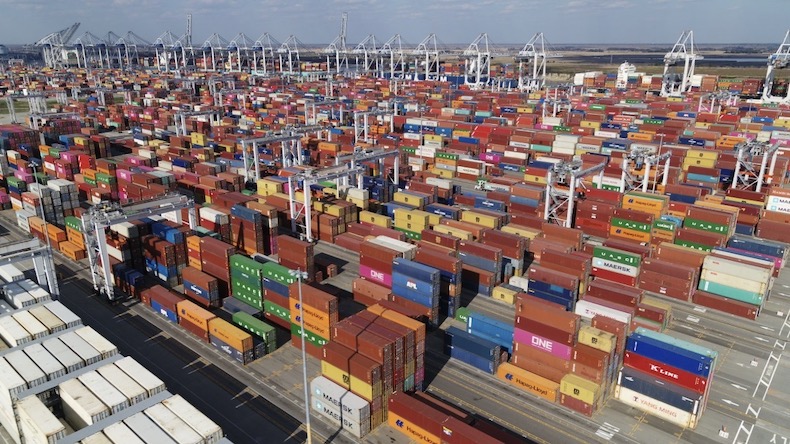 Port of Savannah with many container boxes stacked up on docks