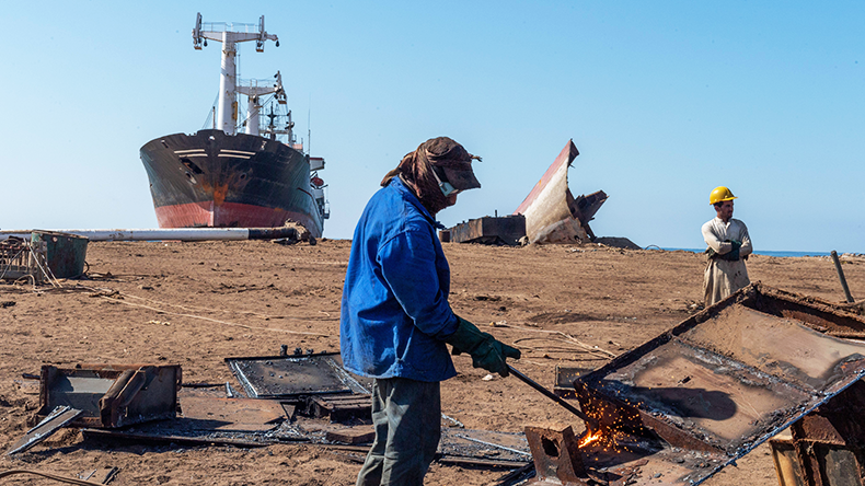 Workers breaking up ships, Gadani ship-breaking yard in Pakistan