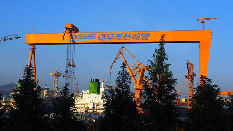 Daewoo Shipbuilding and Maritime Engineering’s (DSME) yard near Geoje, South Korea with a large crane works and LNG tanker