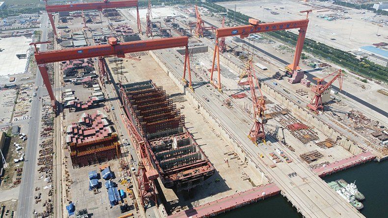 Aerial photo shows a containership under construction at China State Shipbuilding Corporation’s Tianjin Shipbuilding in north China