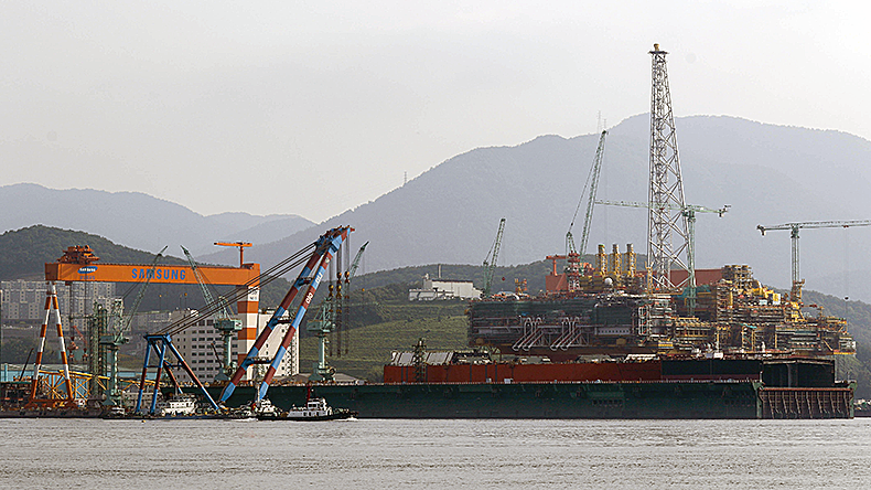 Ships under construction sit moored at the Samsung Heavy Industry shipyard in Geoje, South Korea.