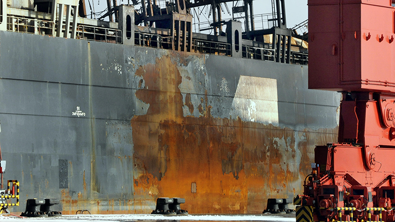 The hull and deck of the containership Flaminia with fire damage while docked