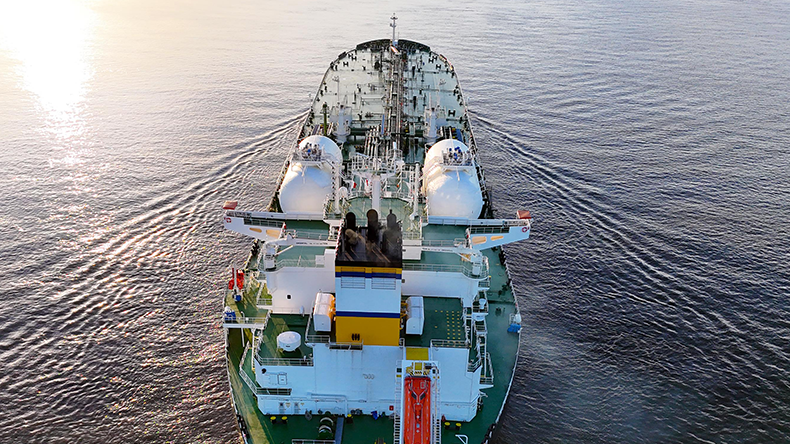 Aframax crude oil tanker heading into the sunset