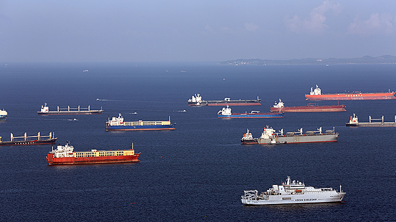 Ships anchored in the Singapore Strait waiting for loading and unloading of cargo