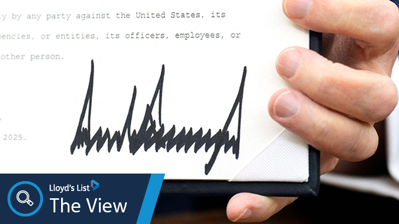 President Donald Trump signs executive orders in the Oval Office  on January 23, 2025