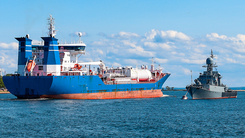 Small anti-submarine ship and chemical tanker at sea