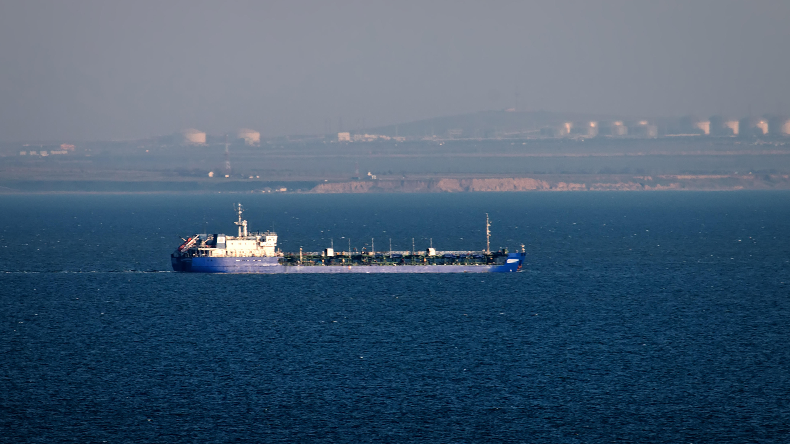 An oil tanker in shipping in the Kerch Strait near Taman anchorage